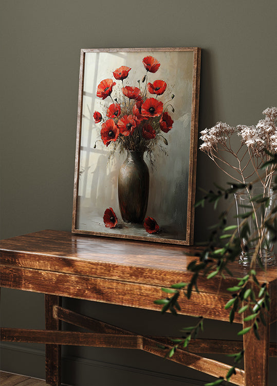 a painting of red flowers in a vase on a table