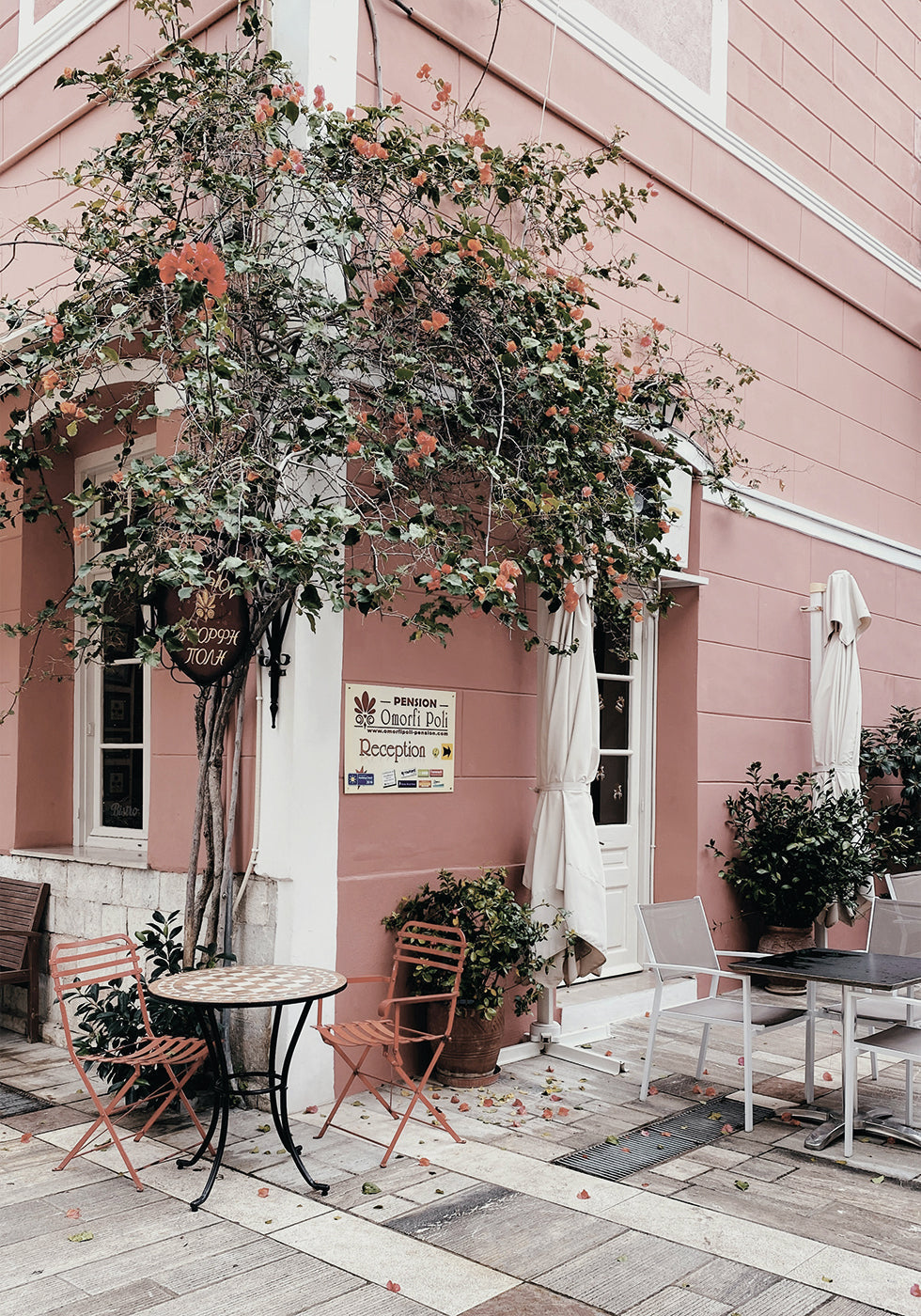 Charming Café Scene in Nafplio Poster