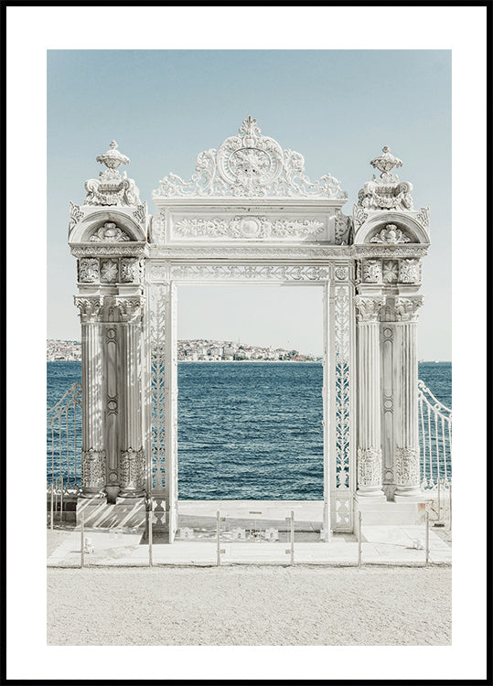 White Decorative Gate by the Sea Poster