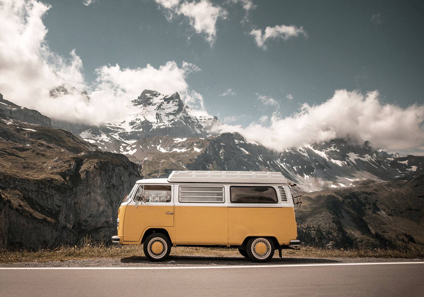 Yellow Van in the Mountains Poster